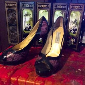9.5 Purple snake skin with black trim heel